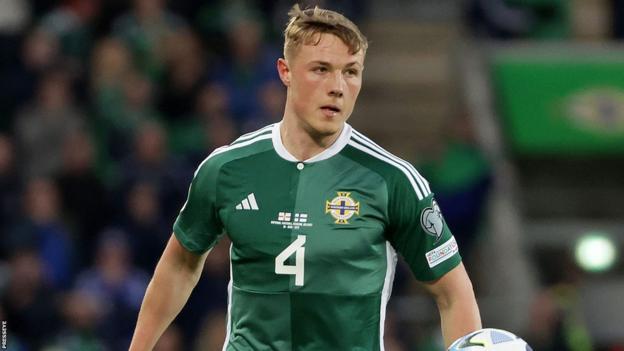 Dan Ballard missed the defeat by Slovenia through injury