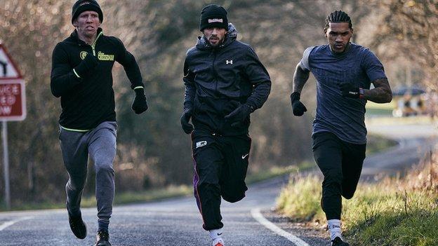 Benn (right) trains in Essex with the likes of British fighters Ted Cheeseman (left) and Joe Cordina (centre)