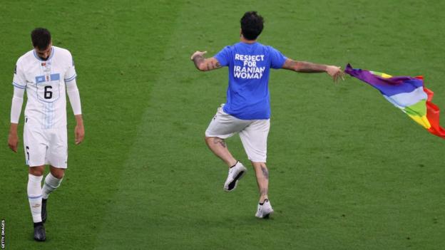 Pitch invader with rainbow flag