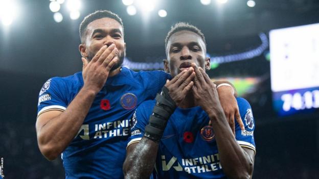 Nicolas Jackson celebrating with Chelsea's Reece James