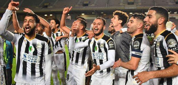 Entente Setif players celebrate the 1-0 victory over Esperance of Tunisia