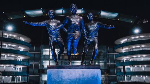 A statue of former Manchester City players Colin Bell, Francis Lee and Mike Summerbee