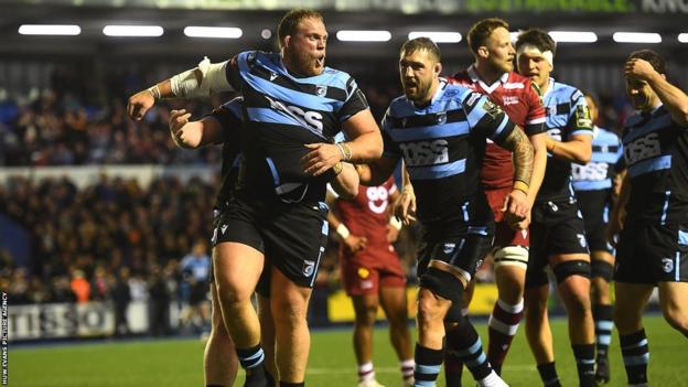 Cardiff prop Corey Domachowski celebrates scoring the opening try for the hosts against Sale