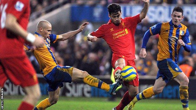Lindon Meikle in action against Liverpool for Mansfield Town in the FA Cup in 2013