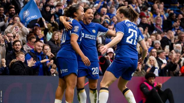 Sam Kerr celebrates at Stamford Bridge