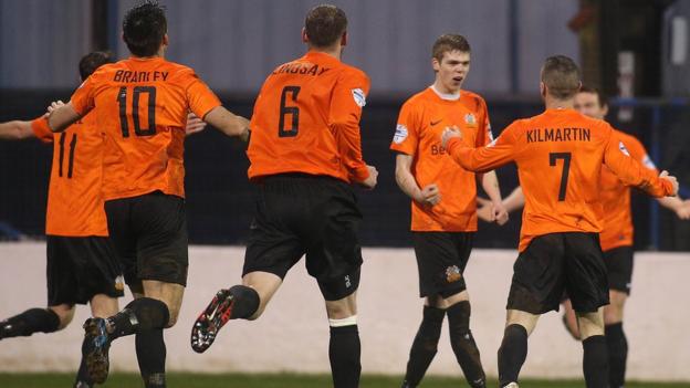 Glenavon players rush in to congratulate Rhys Marshall after he scores the opener in a 2-0 win over the Bannsiders