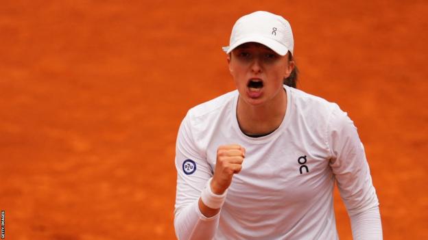 Iga Swiatek reacts to winning a point at the Italian Open in Rome