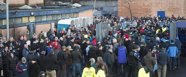 Supporters are evacuated from Scotstou Stadium
