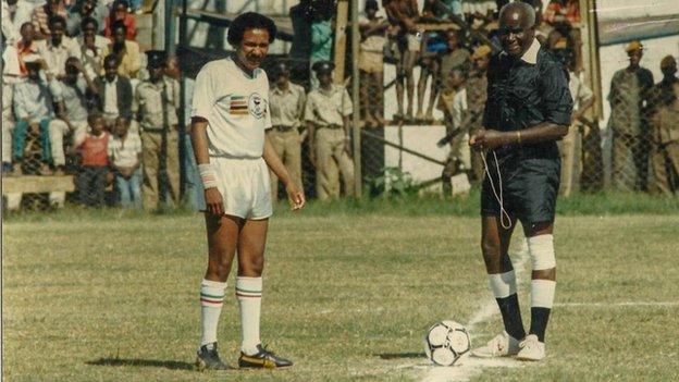 The late Kenneth Kaunda (left) set to referee a football match