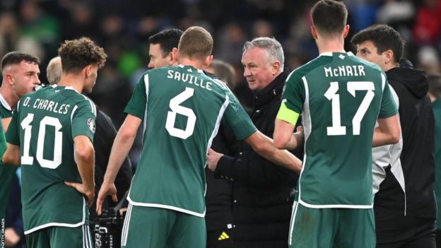 Northern Ireland manager Michael O'Neill with his players