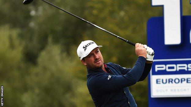 Graeme McDowell tees off at the 12th hole in Germany