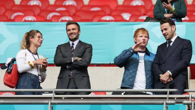 Cherry Seaborn, David Beckham and Ed Sheeran are seen in the stands at Wembley