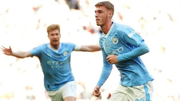 Kevin de Bruyne celebrates as Cole Palmer scores in the Community Shield