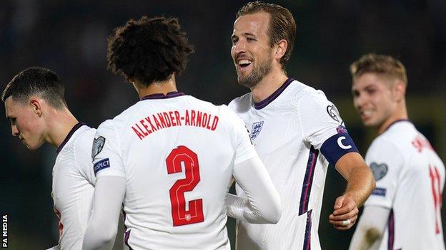 Harry Kane celebrates with Trent Alexander-Arnold