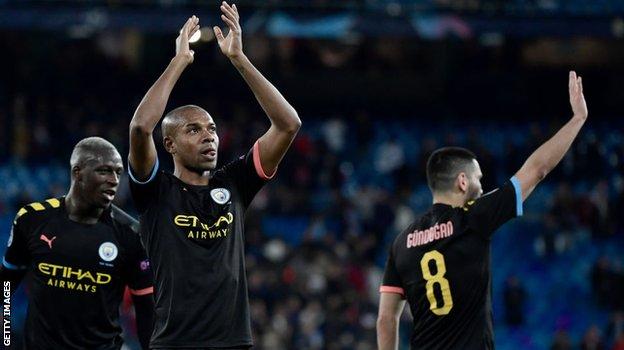 Man City players salute their fans at the final whistle in Madrid