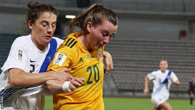 Carrie Jones competes with Greece's Vasiliki Giannaka