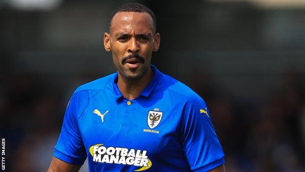 Liam Trotter in action for AFC Wimbledon