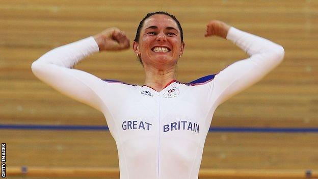 Sarah Storey celebrates on the podium at the velodrome at the Beijing 2008 Paralympics