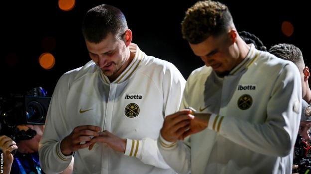 Nikola Jokic and Michael Porter Jr of the Denver Nuggets are presented with their NBA championship rings before their match against the LA Lakers