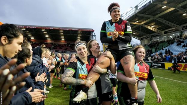 Shaunagh Brown is chaired off the pitch following her final game for Harlequins Women
