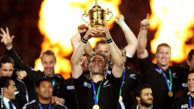 Captain Richie McCaw of the All Blacks lifts the Webb Ellis Cup