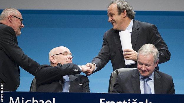 Michael van Praag and Michel Platini