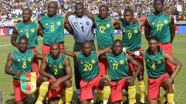 Cameroon players line up ahead of a match at the 2002 Africa Cup of Nations