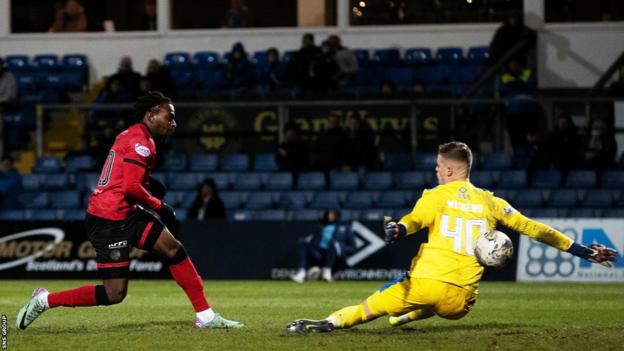 St Mirren’s Toyosi Olusanya scores to make it 1-1 during a cinch Premiership match between Ross County and St Mirren at the Global Energy Stadium