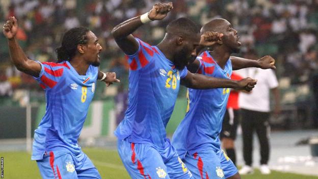 Yoane Wissa celebrates his goal for DR Congo against Guinea at the 2023 Africa Cup of Nations with team-mates