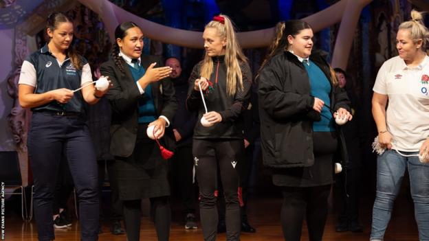 Michaela Leonard, Hannah Jones and Marlie Packer put their poi skills to the test