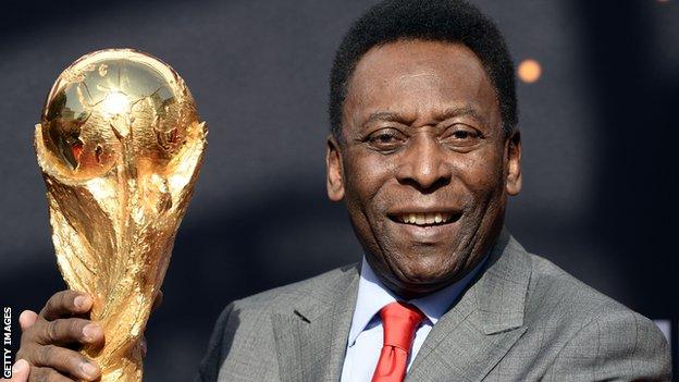 Pele with the World Cup trophy