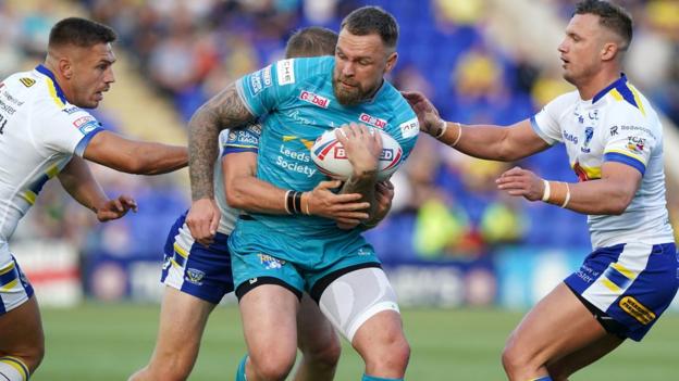 Leeds Rhinos' Blake Austin carries the ball against Warrington