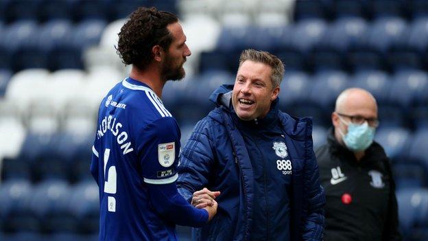 Sean Morrison (L) with Neil Harris