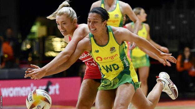 England's Helen Housby reaches for the ball
