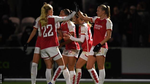 Frida Maanum and Katrine Kuhl celebrate after Arsenal score