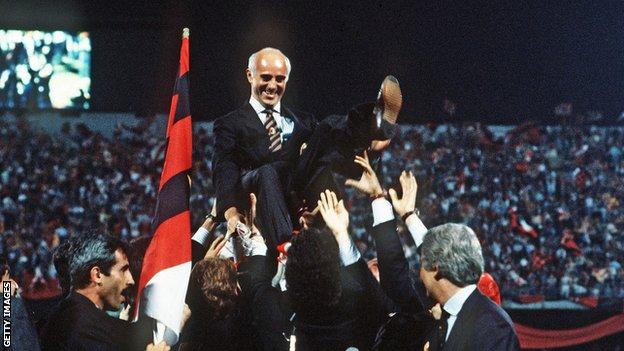 Arrigo Sacchi is hoisted aloft by celebrating Milan players