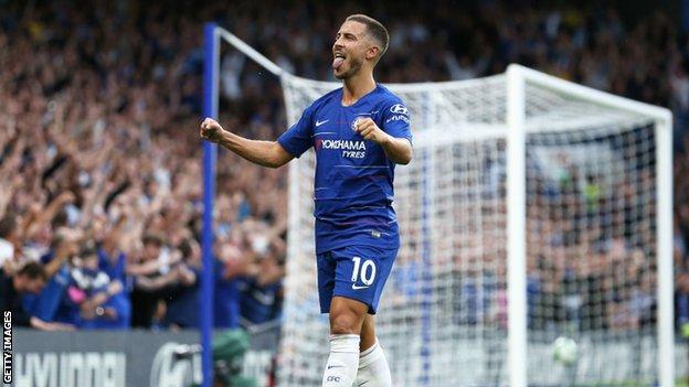 Eden Hazard celebrates after providing the assist for Marcos Alonso's winning goal in Chelsea's 3-2 win over Arsenal on 18 August 2018