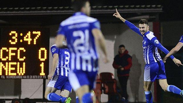 Darragh Noonan celebrates his early opener for Newry City at Solitude