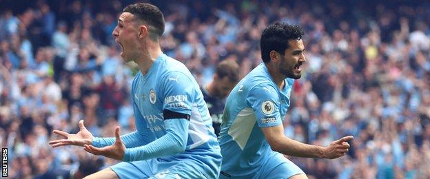 Phil Foden and Ilkay Gundogan celebrate Manchester City's winning goal against Aston Villa
