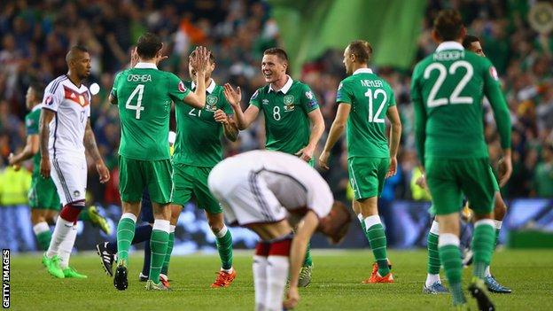 Republic of Ireland players celebrate scoring against Germany