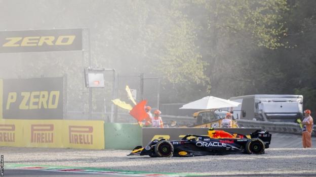 Sergio Perez's Red Bull in the gravel trap after he crashed during Italian GP second practice