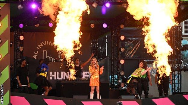 Becky Hill appears at halftime during The Hundred game between the Oval Invincibles and the Manchester Originals