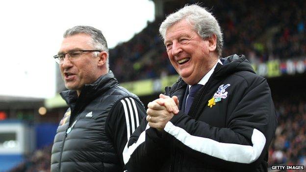 Crystal Palace manager Roy Hodgson speaks with Watford manager Nigel Pearson