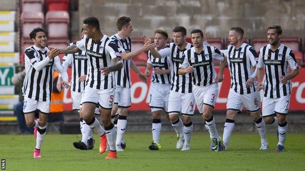 Dunfermline Athletic players celebrate taking the lead against Dundee