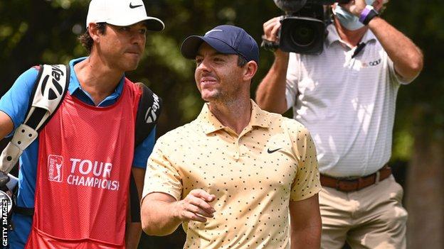 Rory McIlroy and his caddie