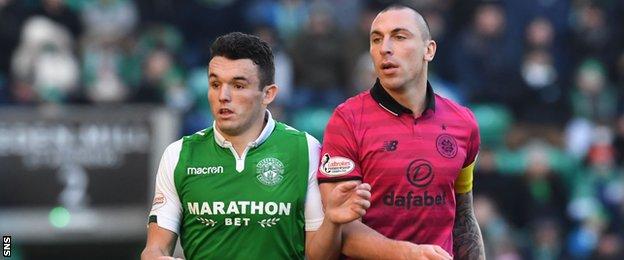 Hibernian midfielder John McGinn (left) And Celtic's Scott Brown