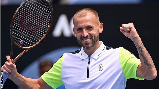 Dan Evans celebrates beating Jeremy Chardy at the Australian Open