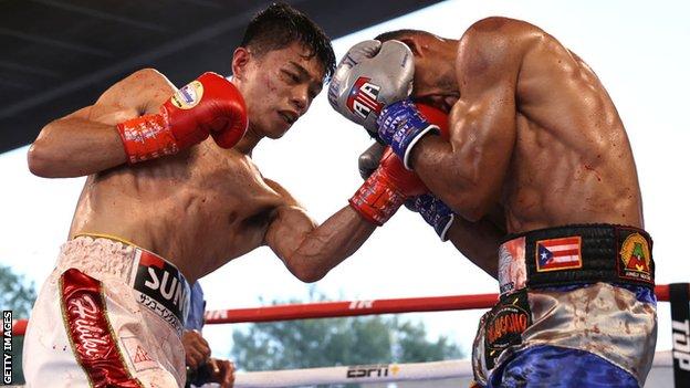 Junto Nakatani lands a blow on Angel Acosta