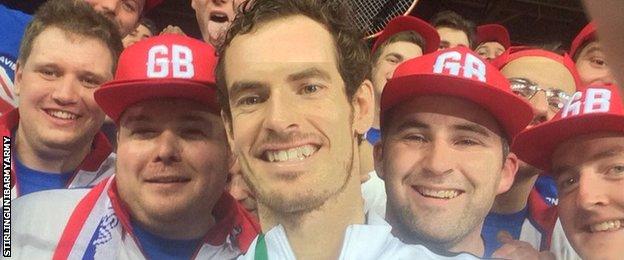 Andy Murray poses with fans