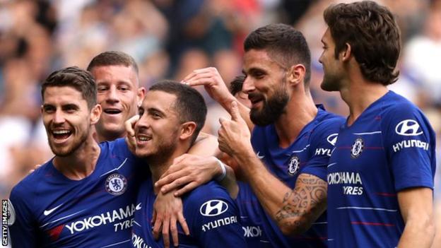 Chelsea celebrate after Eden Hazard scores his hat-trick against Cardiff City
